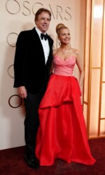 Kevin Nealon and Susan Yeagley arrive at the Oscars on Sunday, March 15, 2026, at the Dolby Theatre in Los Angeles. (Photo by Richard Shotwell/Invision/AP)