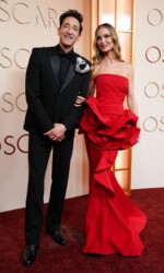 Adrien Brody and Georgina Chapman arrive at the Oscars on Sunday, March 15, 2026, at the Dolby Theatre in Los Angeles. (Photo by Richard Shotwell/Invision/AP)