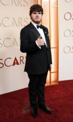 Aidan Delbis arrives at the Oscars on Sunday, March 15, 2026, at the Dolby Theatre in Los Angeles. (Photo by Richard Shotwell/Invision/AP)