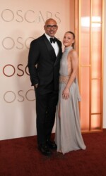 Harvey Mason Jr., left, and Britt Burton arrive at the Oscars on Sunday, March 15, 2026, at the Dolby Theatre in Los Angeles. (AP Photo/Gregory Bull)