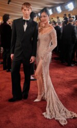 Calum Harper, left, and and Jihoon Kim arrive at the Oscars on Sunday, March 15, 2026, at the Dolby Theatre in Los Angeles. (AP Photo/John Locher)